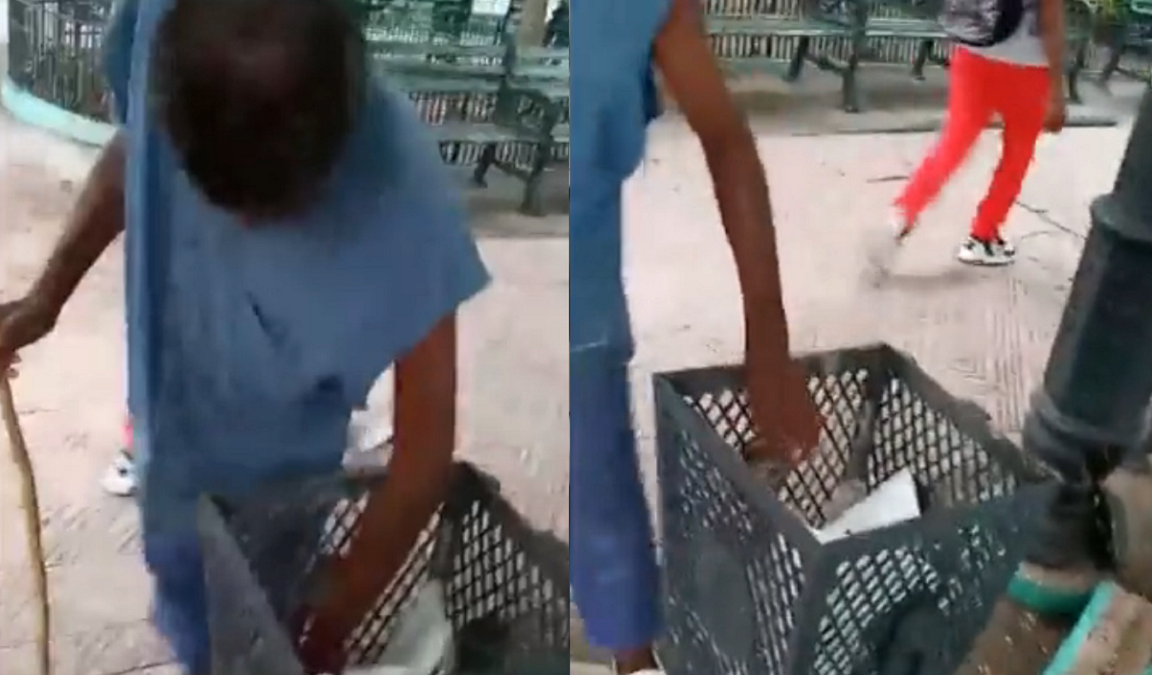 Captan a santiaguero buscando entre los depósitos de basura algo para comer